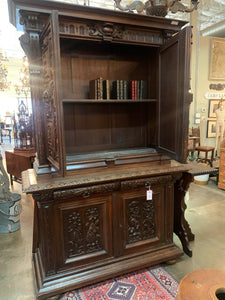 Large Carved Cabinet with Faces