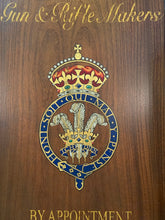 close up of crest with crown for J. Purdey and Sons
